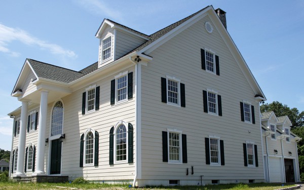 Comment peindre la façade d'une maison en bois