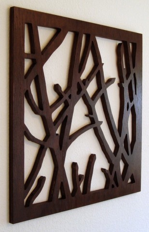 Les panneaux en bois avec des motifs inhabituels sculptés deviendront une décoration digne de n'importe quel mur