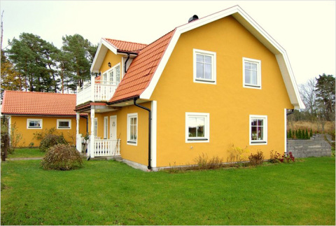 Peindre une maison avec de la peinture au ciment